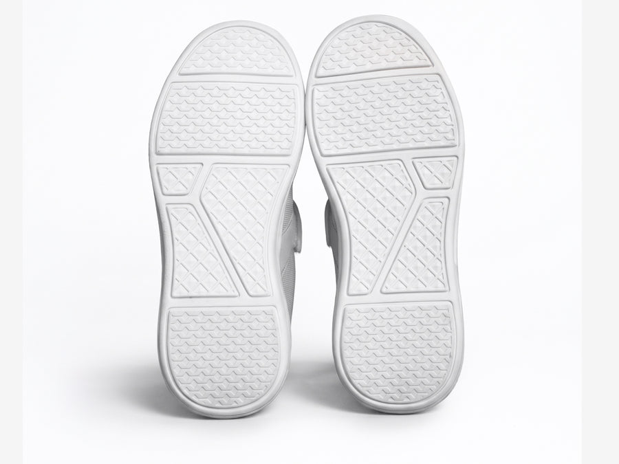 Silwer Ease outsoles seen from below, showing the wide tread pattern