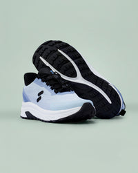 Pair of Silwer Active Ice Blue Men's Shoes, one in side profile and one turned to show the black treaded outsole