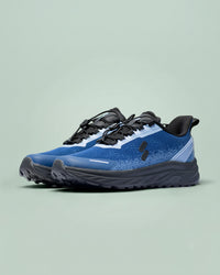 Silwer Active Ink Blue Men's Shoes, pair shown at a three-quarter angle, deep blue mesh upper with black accents, on a mint green background