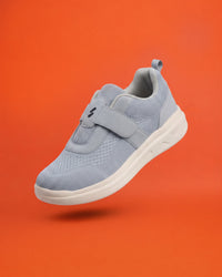 Silwer Ease Castle Grey Men's Shoe, angled view on an orange background